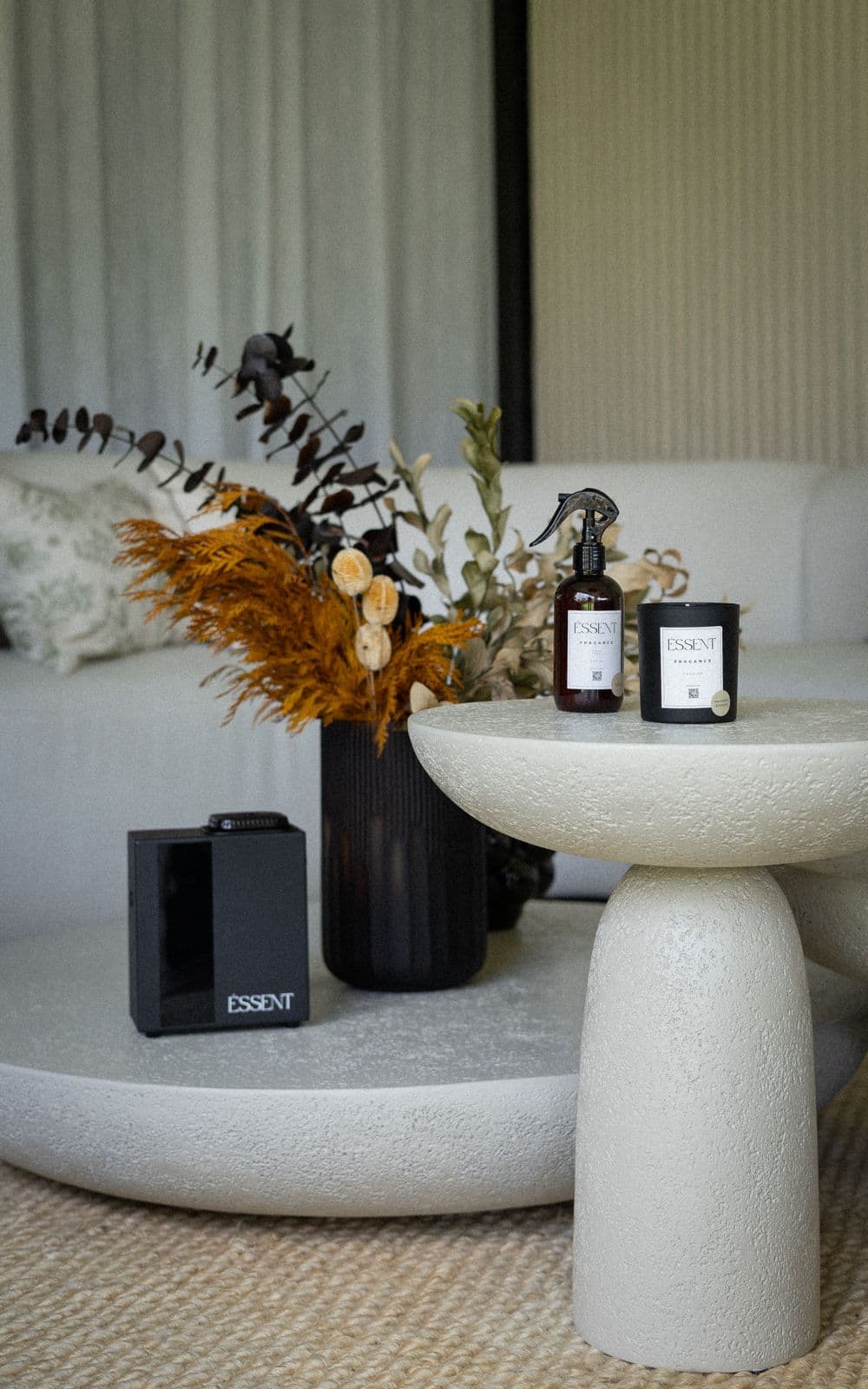 ÉSSENT collection styled on a coffee table